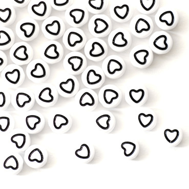 Plastic bead 7×3.5 mm Heart black and white pack of 10 pcs.