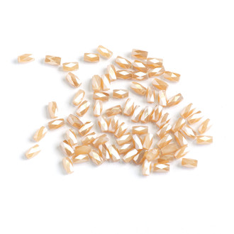 Koralik kryształowy cylindryczny 6x4 mm beżowy 1 szt