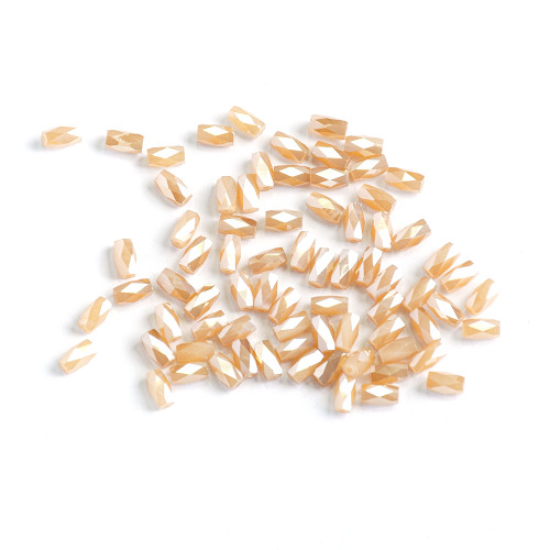 Koralik kryształowy cylindryczny 6x4 mm beżowy 1 szt