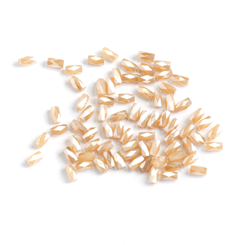 Koralik kryształowy cylindryczny 6x4 mm beżowy 1 szt