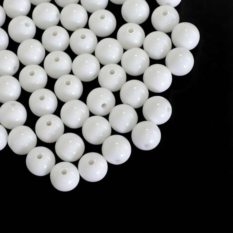 Koralik plastikowy 11 mm biały 1 szt