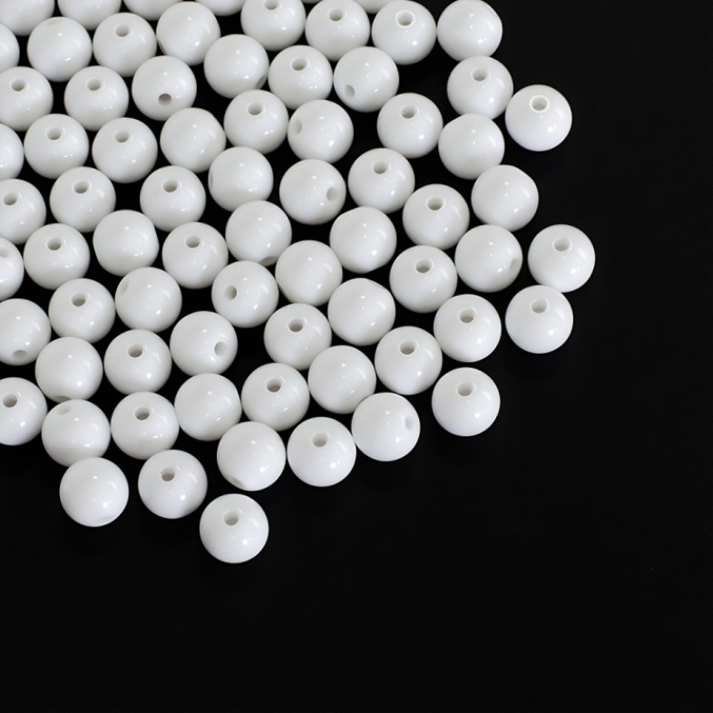 Koralik plastikowy 9 mm biały 1 szt