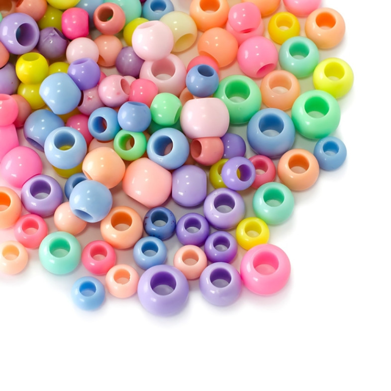 Koralik plastikowy 10x7,5 mm różowy 1 szt