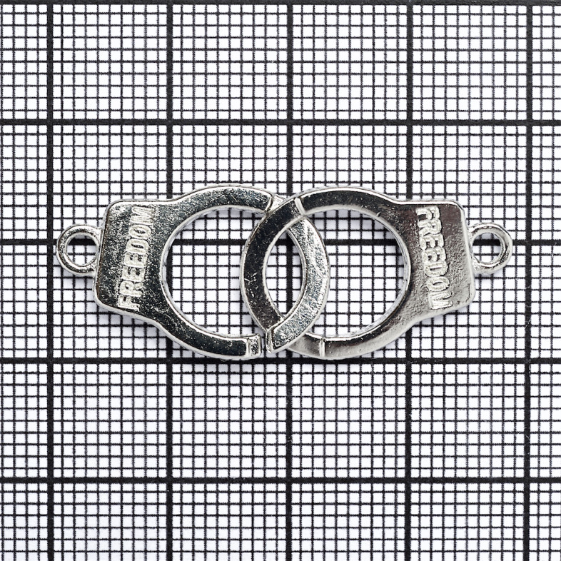 Metal connector Handcuffs 40×15 mm cupronickel 1 pc.