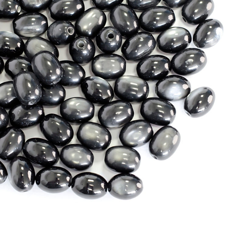 Koralik plastikowy imitujące kocie oko 8x12 mm czarny 1 szt