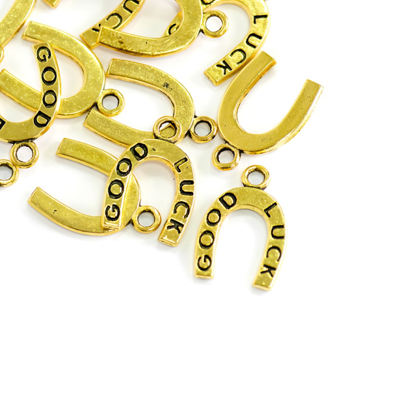 Metal pendant Horseshoe gold 1 pc