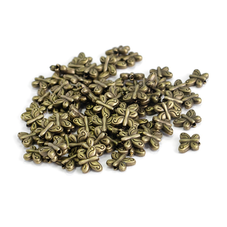 Koralik metaliczny Motyl w kolorze brązu 1 szt