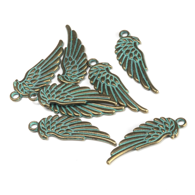 Metal pendant Wing oxidized bronze 1 pc.