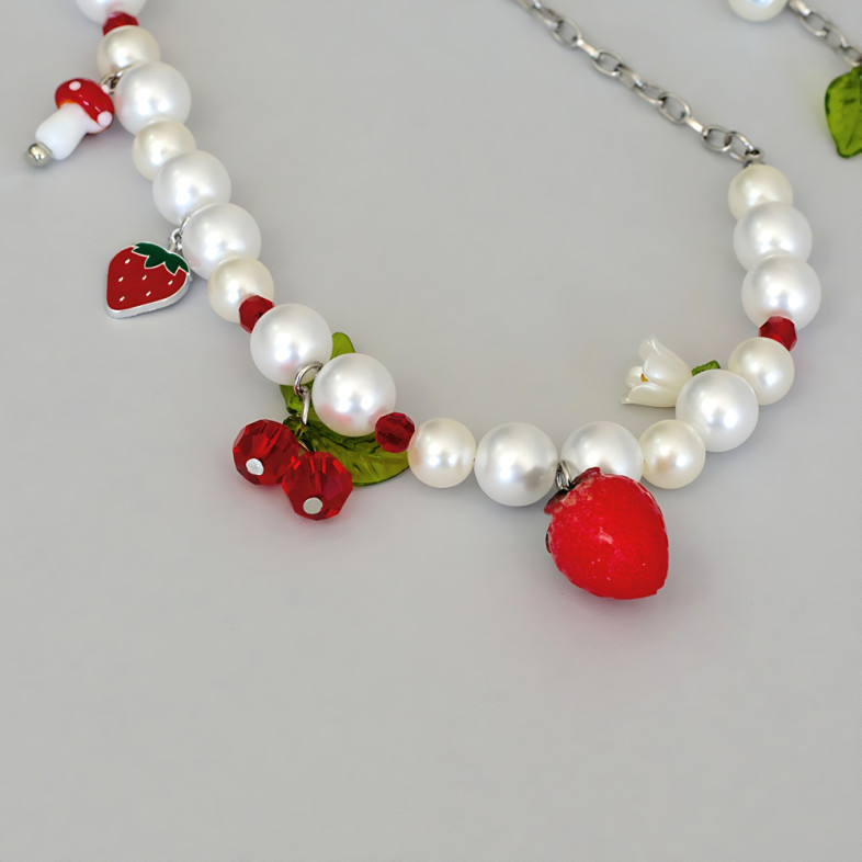 Bracelets (pair) made of glass beads and plastic pendants for legs No. 3