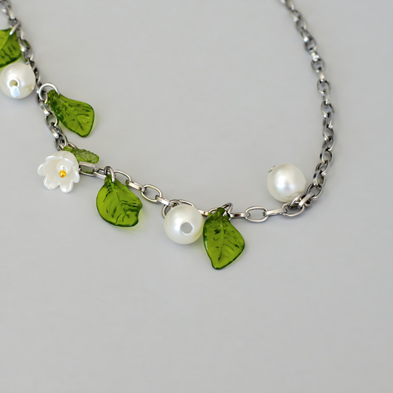 Bracelets (pair) made of glass beads and plastic pendants for legs No. 3