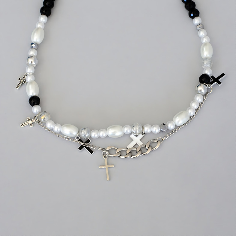 Bracelets (pair) made of plastic and glass beads and with enamel pendants for feet No. 6