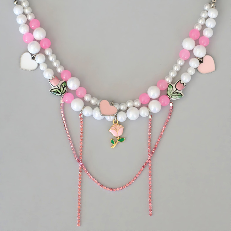 Bracelets (pair) made of plastic and glass beads and with enamel pendants for feet No. 7