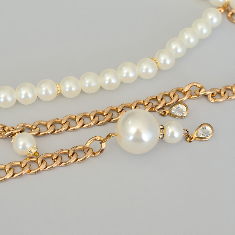 Bracelet made of plastic beads and a chain on the waist No. 9