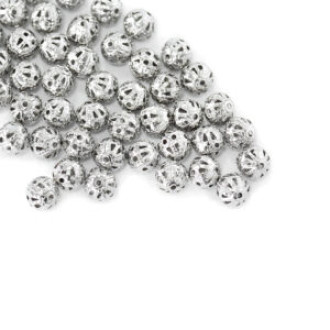Ażurowy koralik 6 mm w kolorze melchioru 1 szt