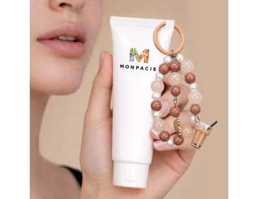 Charm for cream tubes