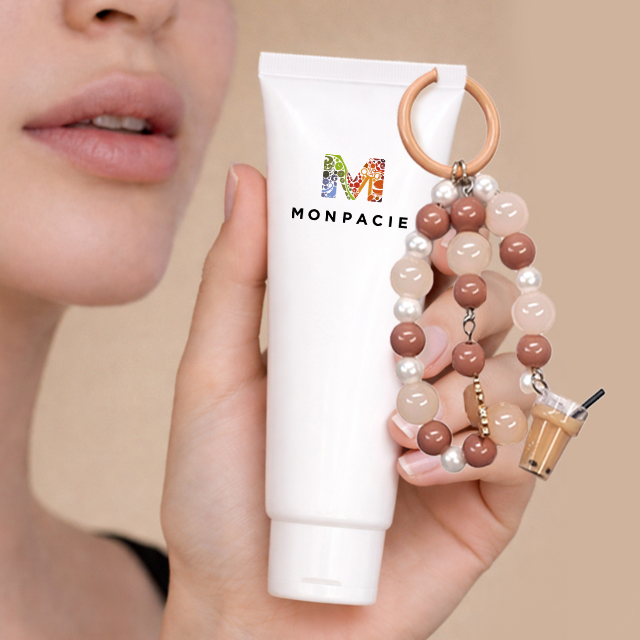 Charm for cream tubes